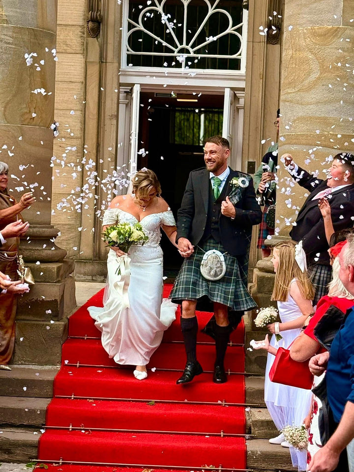 Real AFW bride wearing the Celtic Pearl off-the-shoulder crepe wedding dress