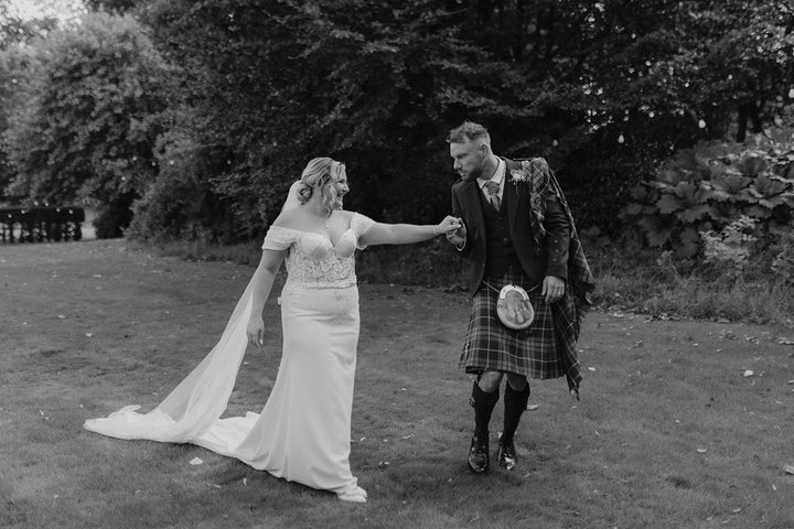 Celtic Pearl wedding gown worn by a real AFW bride with the groom in Scotland