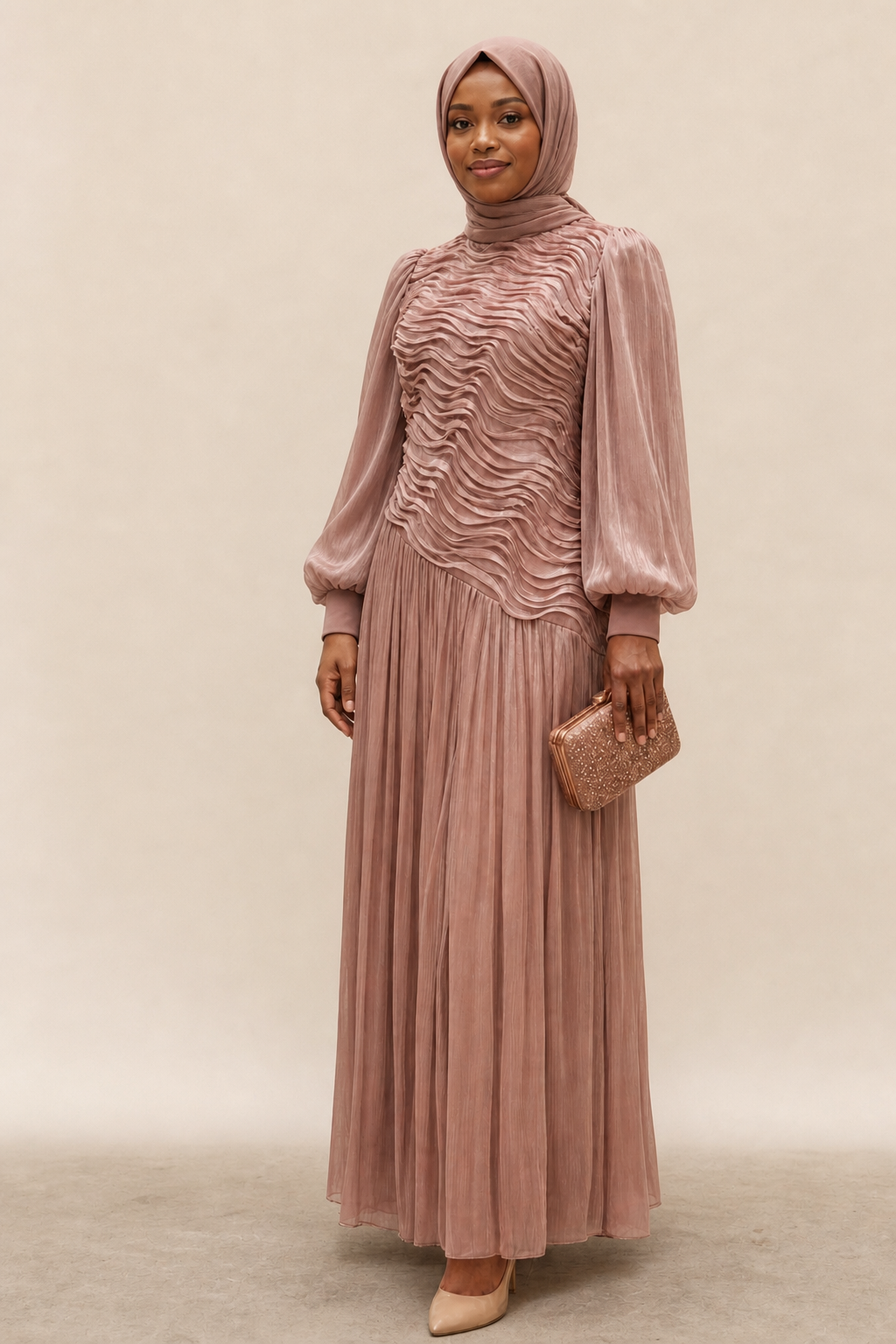 Dusty rose modest occasion dress with textured wave bodice, pleated skirt and balloon sleeves