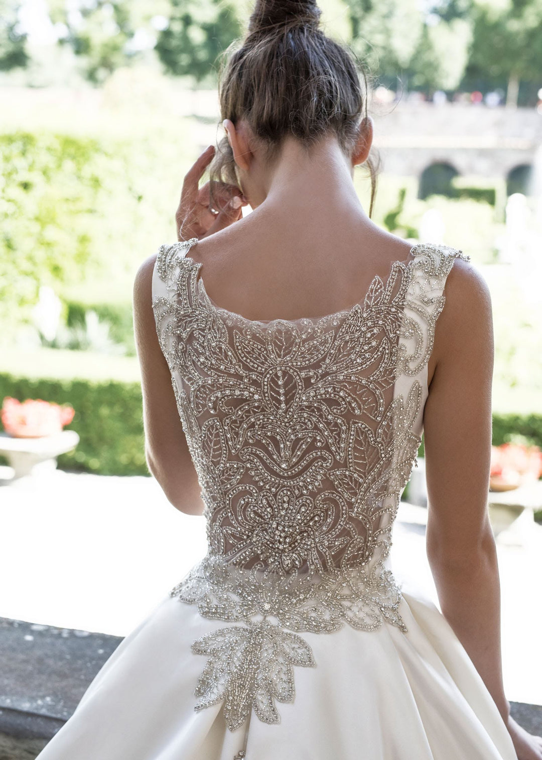 Illusion back wedding dress with crystal beadwork and covered buttons