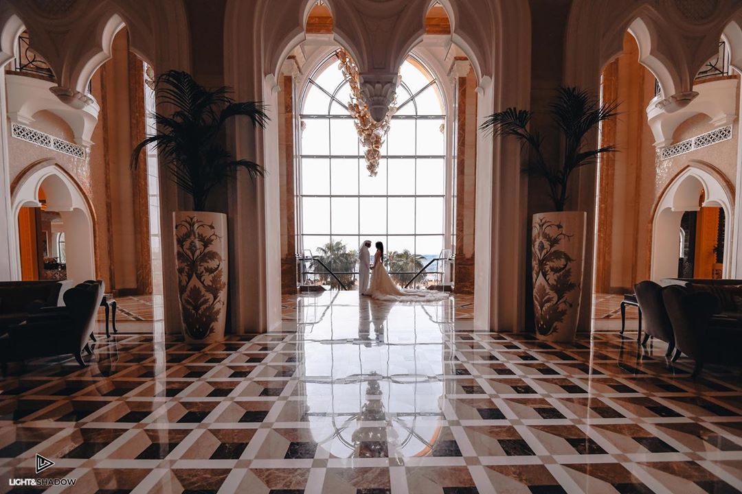 Lace and tulle wedding dress photographed inside an elegant bridal venue