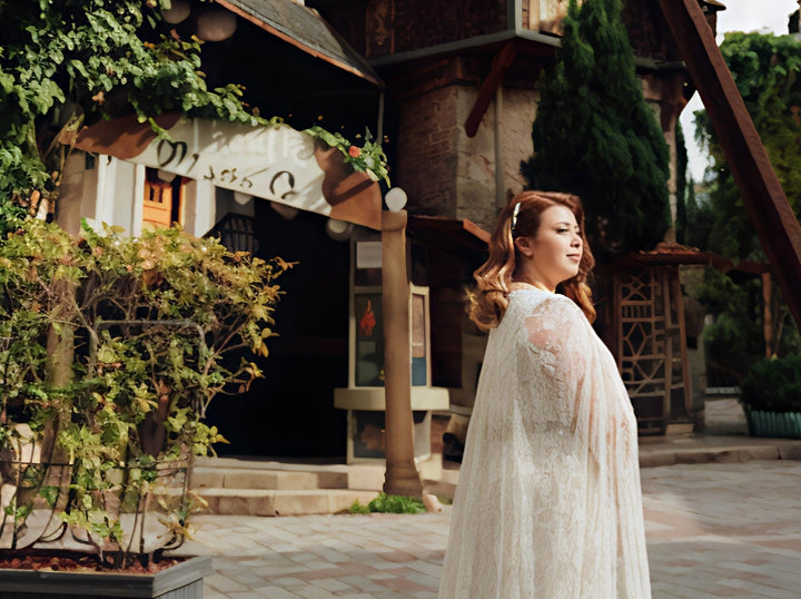 Ethereal Lace Cape Wedding Dress – Elegant Flowing Train | Aisha Fashion World Bridal
