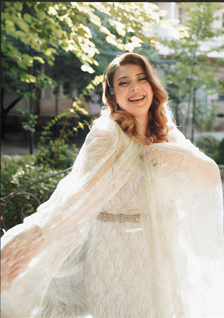 Ethereal Lace Cape Wedding Dress – Elegant Flowing Train | Aisha Fashion World Bridal