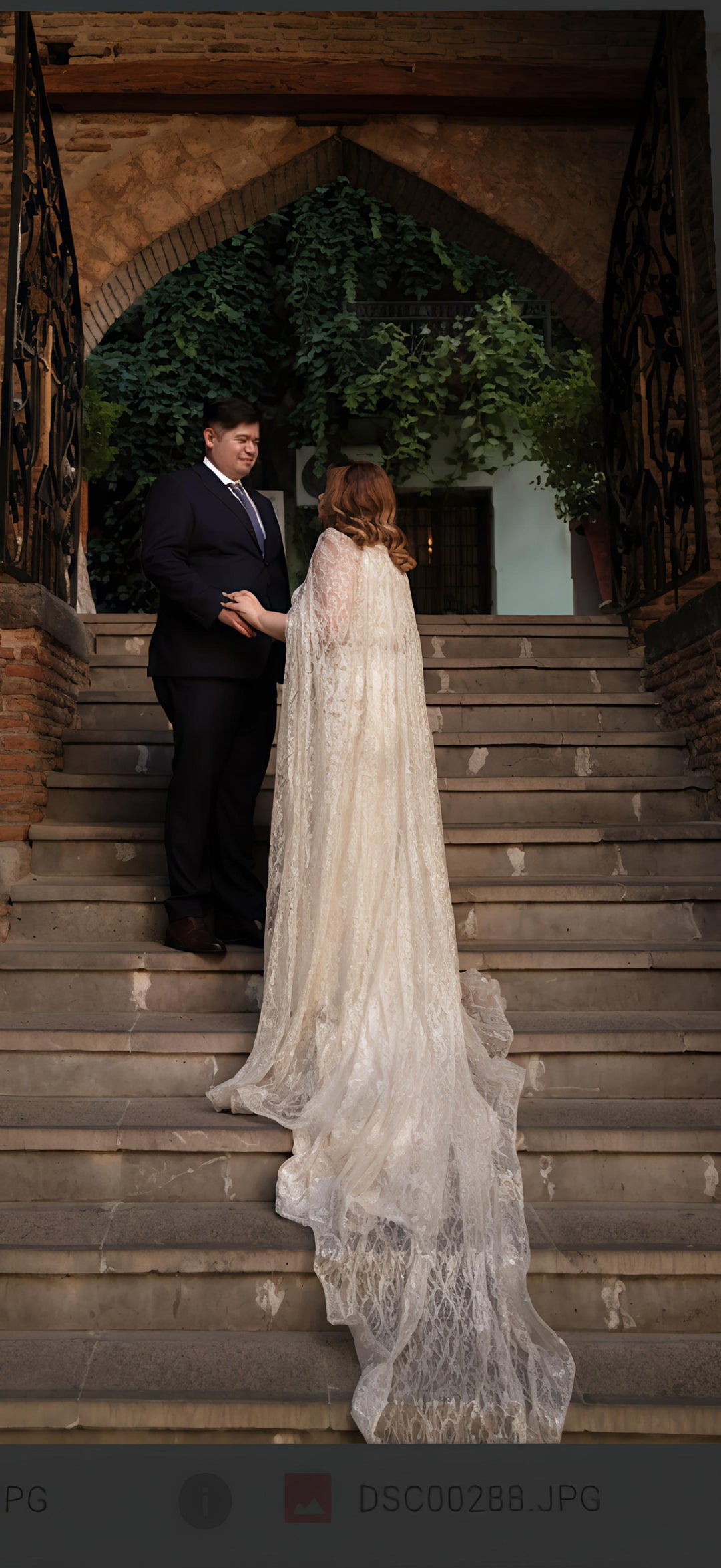 Ethereal Lace Cape Wedding Dress – Elegant Flowing Train | Aisha Fashion World Bridal