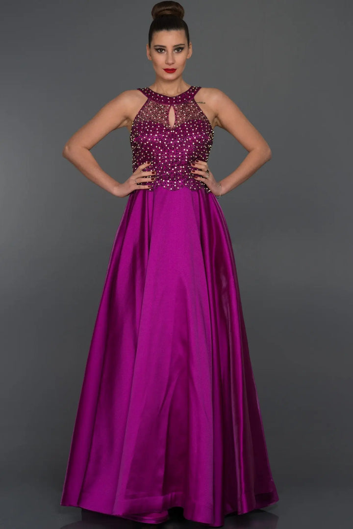 Turn heads at your next special occasion with this show-stopping dress from Aisha Fashion World. The fuchsia bodice is adorned with intricate beading and embroidery, while the flowing skirt cascades to the floor in fuchsia. The dress is made from high-quality materials and is sure to make you feel like a princess.