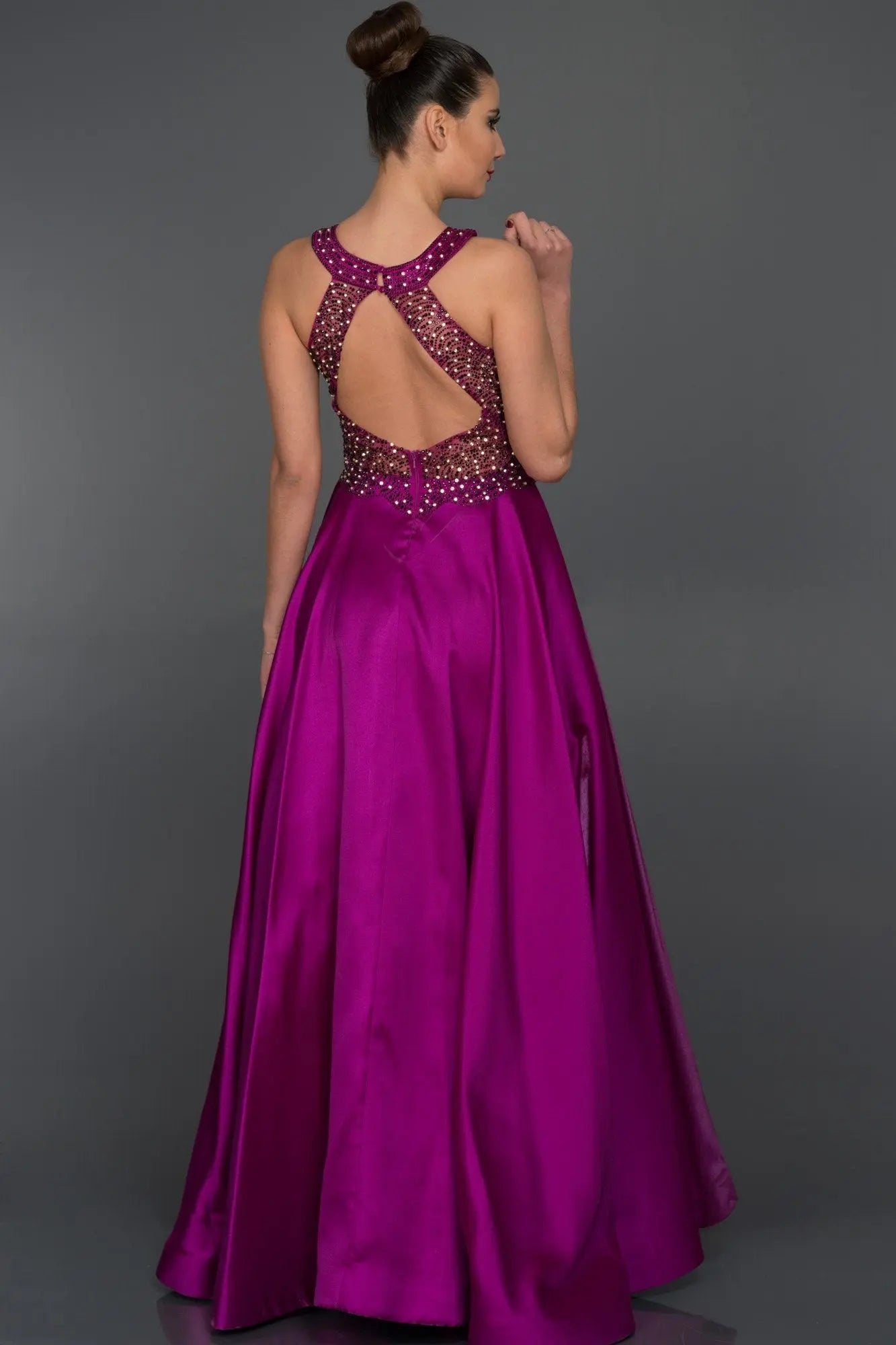 Turn heads at your next special occasion with this show-stopping dress from Aisha Fashion World. The fuchsia bodice is adorned with intricate beading and embroidery, while the flowing skirt cascades to the floor in fuchsia. The dress is made from high-quality materials and is sure to make you feel like a princess.