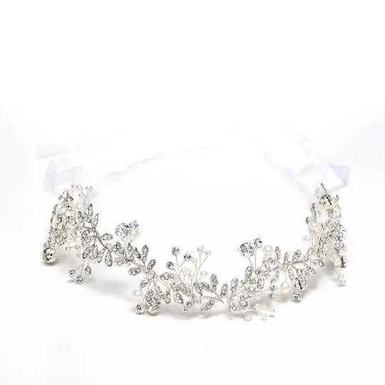 Elevate your wedding hairstyle with the AFWT-15053S Silver Hairvine  Crafted from high-quality materials, the AFWT-15053S Silver Hairvine is a stunning addition to any wedding hairstyle. The delicate details and sparkling crystals add a touch of elegance and sophistication, while the lightweight design ensures all-day comfort. This hairvine is perfect for brides who want a touch of sparkle without going over the top.