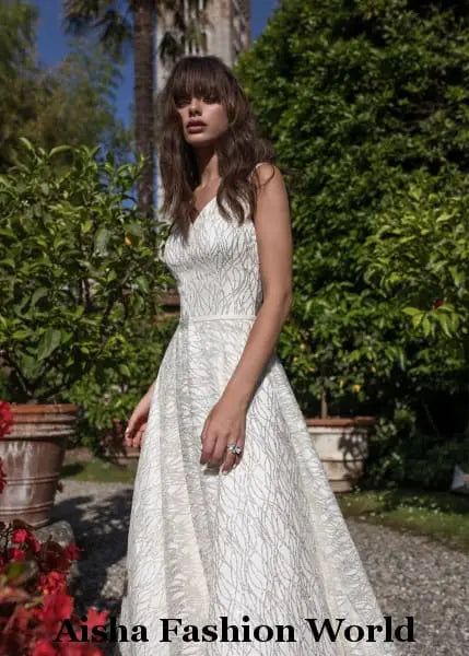 Leave a lasting impression on your wedding day with the AFW Veronika Handmade Lace Wedding Dress. This elegant and timeless dress is crafted with premium handmade lace, making it the perfect choice for the bride who is looking for a classic and sophisticated look.