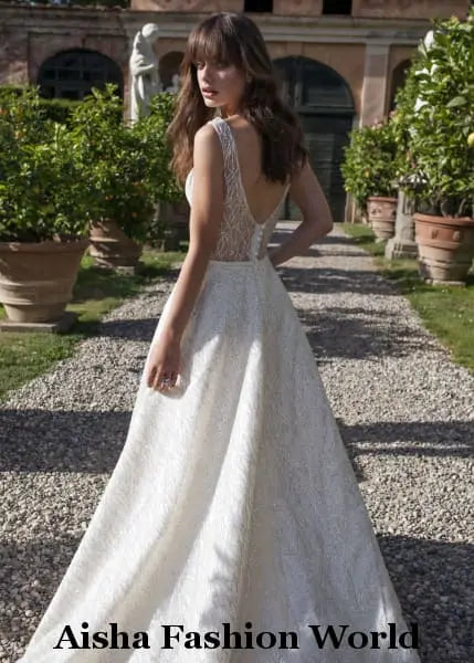 Leave a lasting impression on your wedding day with the AFW Veronika Handmade Lace Wedding Dress. This elegant and timeless dress is crafted with premium handmade lace, making it the perfect choice for the bride who is looking for a classic and sophisticated look.