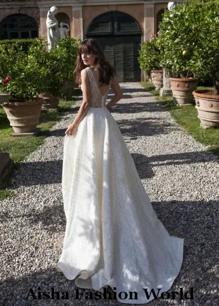 Leave a lasting impression on your wedding day with the AFW Veronika Handmade Lace Wedding Dress. This elegant and timeless dress is crafted with premium handmade lace, making it the perfect choice for the bride who is looking for a classic and sophisticated look.