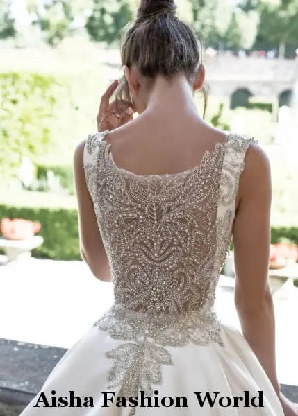 Elegant high end  wedding dress with crystal decoration at the back available in Qatar - aishafashionworld