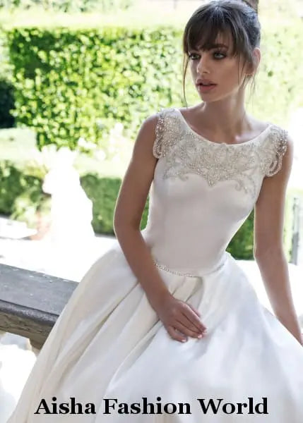 Elegant high end  wedding dress with crystal decoration at the back available in Qatar - aishafashionworld
